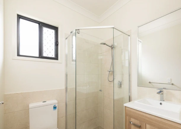 Spacious accessible bathroom in Beatty Road disability-friendly unit.
