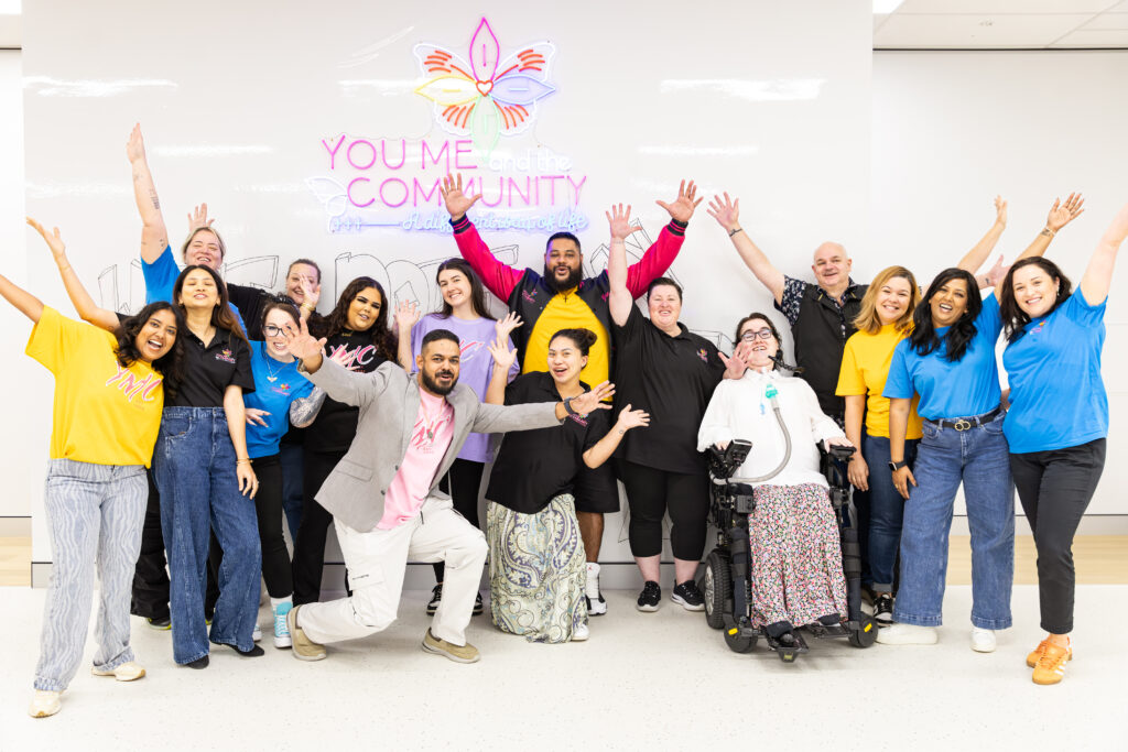 you me and the community team with arms the air