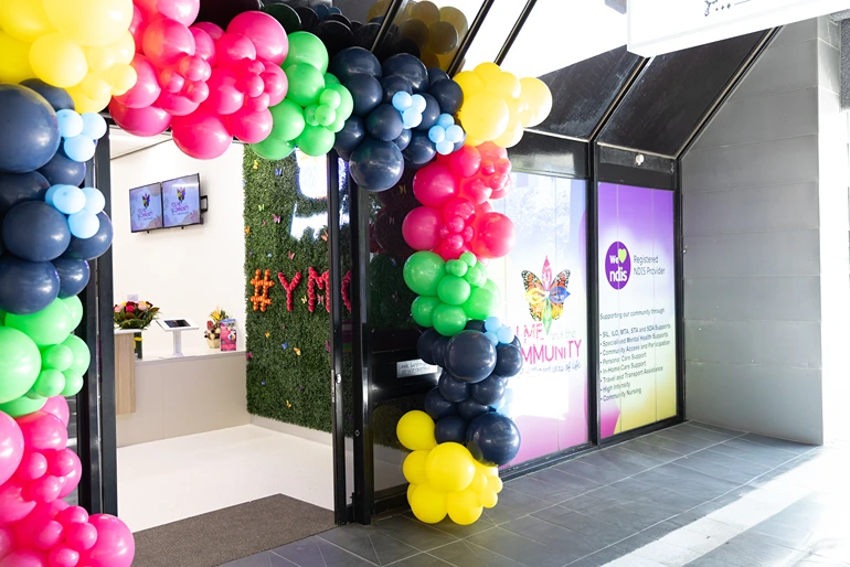 Indoor kids party venue in Ipswich & Springfield decorated with colourful balloons at The Legacy Hub by You Me & the Community.