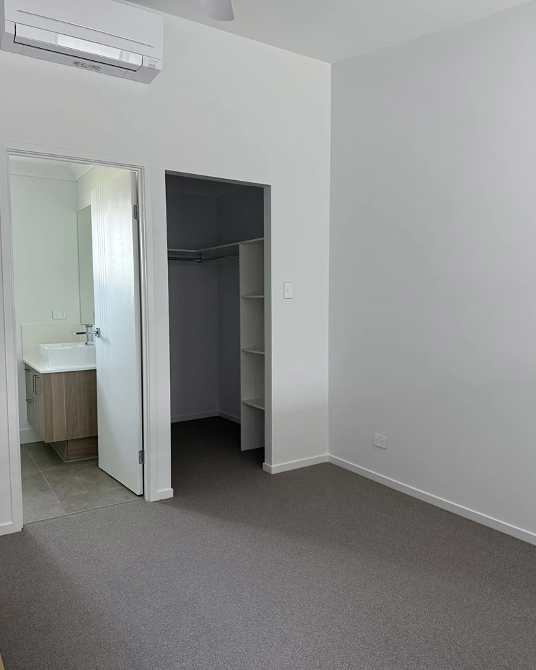 Bedroom with built-in wardrobe at You Me and the Community, Acacia Ridge