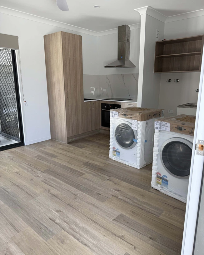 Spacious kitchen and living area at You Me and the Community, Acacia Ridge