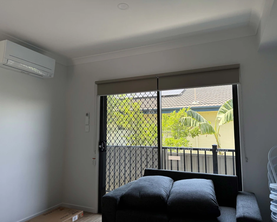 Living room with air conditioning at Acacia Ridge You Me and the Community unit