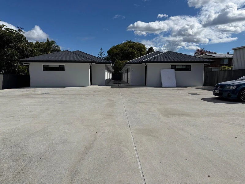 Wide front parking area and modern accommodation buildings at 495 Beatty Road Acacia Ridge