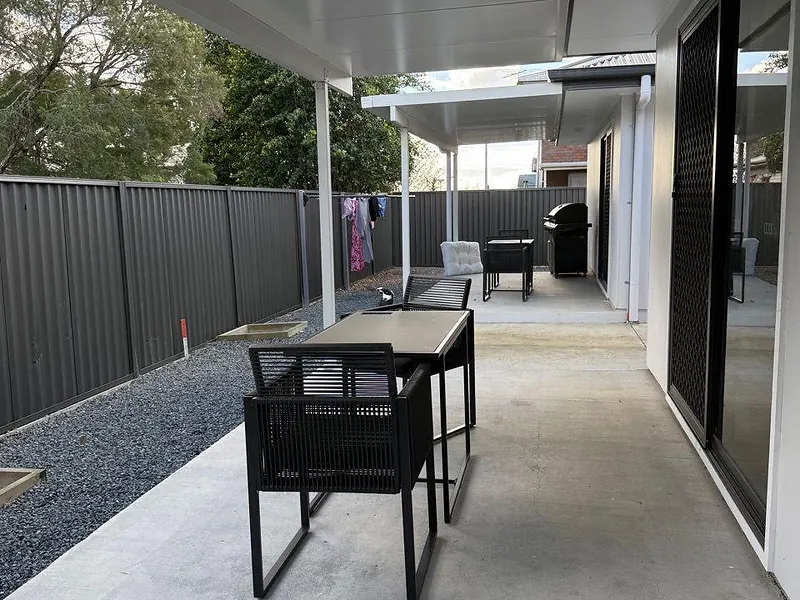 Private covered patio and gravel courtyard at 495 Beatty Road Acacia Ridge