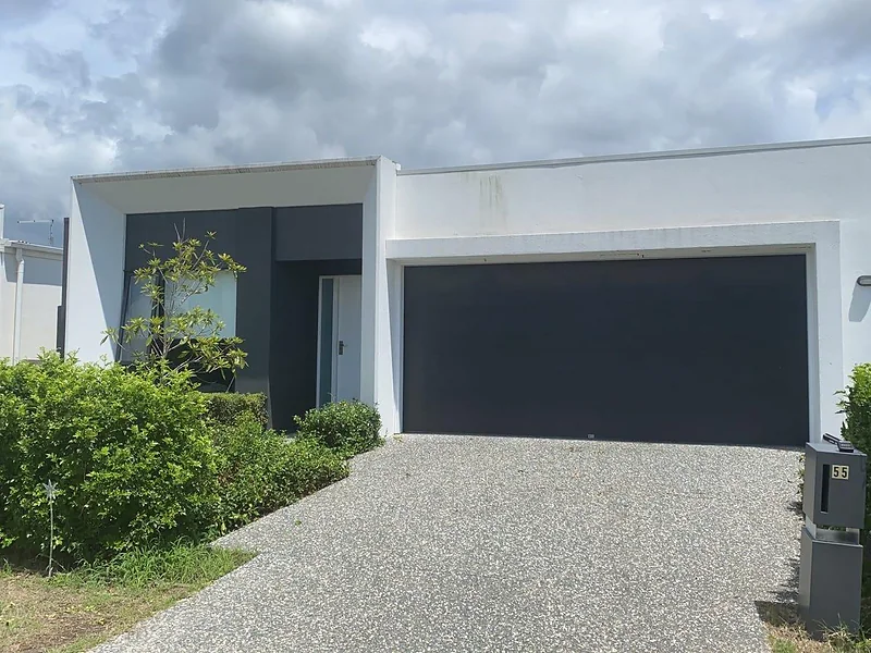 Modern front exterior and driveway at 55 Hill Drive Pimpama property