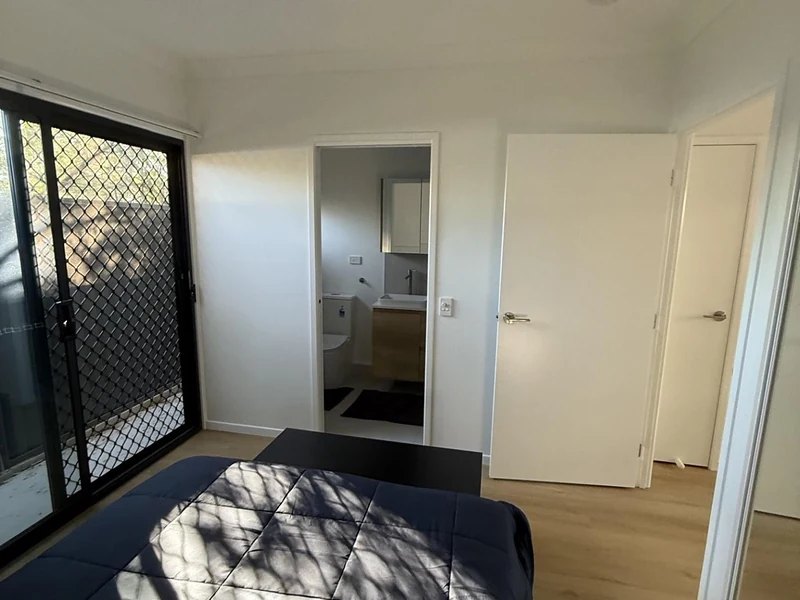 Bedroom view with ensuite entry and built-in wardrobe at 89 Marshall Road Rocklea
