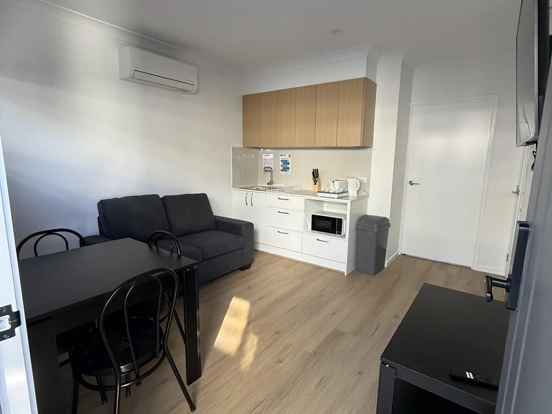 Furnished living and kitchenette area at 89 Marshall Road Rocklea accommodation