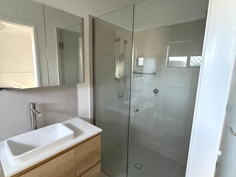 Modern bathroom with glass shower and vanity at 89 Marshall Road Rocklea accommodation