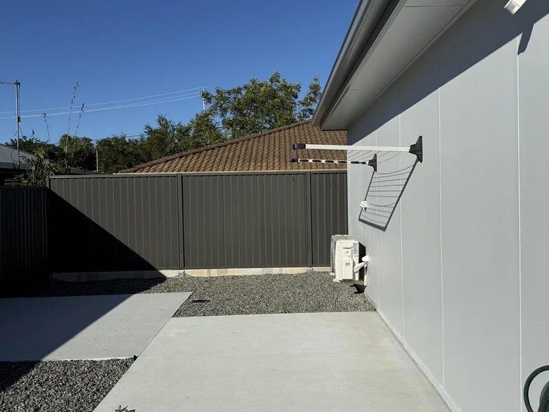 Private outdoor courtyard with concrete patio and gravel area at 89 Marshall Road Rocklea