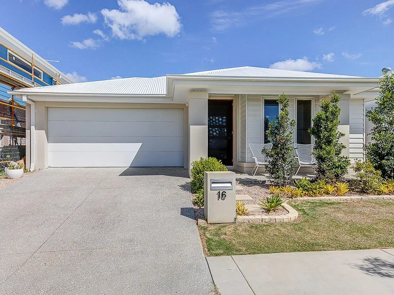 Front exterior of a single-storey home with driveway and garage in Greenbank