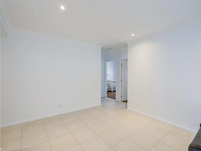 Open interior living space with tiled flooring in Greenbank